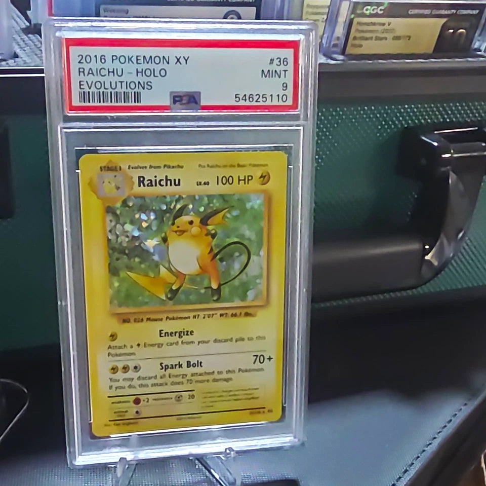 PSA 9 Raichu Holo XY Evolutions front